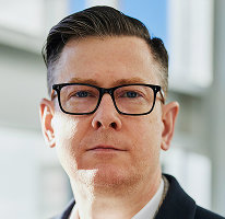 Alexander Hughes, CEO executive at a crypto trading company, portrait